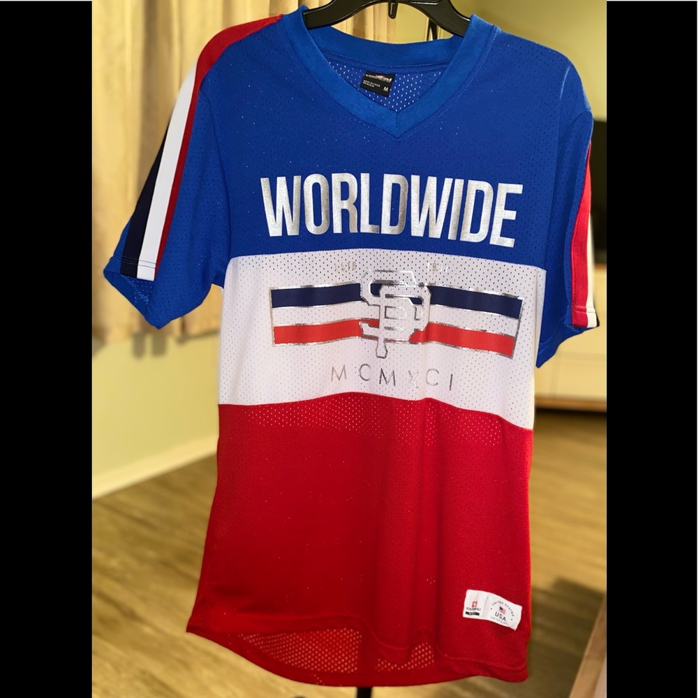 Jersey type of shirt, summer fresh. Fits medium or large